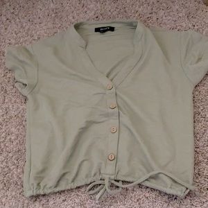 XS sage green top original price $20 selling for $5